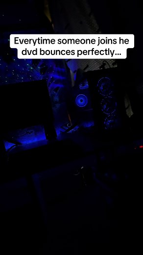 Futuristic Computer Setup with Bouncing DVD Icon