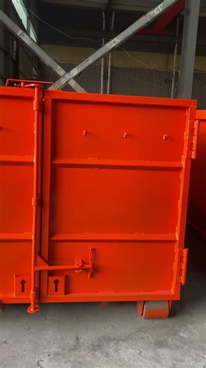 Our hook lift bin is built tough with thick steel—perfect for construction and industrial waste!