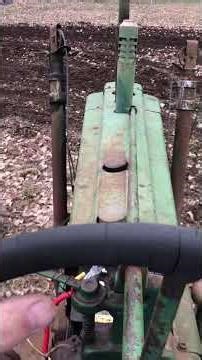 1946 B john Deere disking