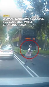 89K views · 8.2K reactions | A woman wearing headphones while jaywalking near Orchard Turn in Singapore was nearly hit by a bus. She didn’t notice the bus until it was inches away, but it stopped just in time. Startled, she quickly stepped back, apologized, and ran off. The incident, captured on dashcam, was posted on Roads.sg on Facebook and occurred on September 13 around 3.09p.m. : Road.sg (Facebook) | SAYS | Facebook