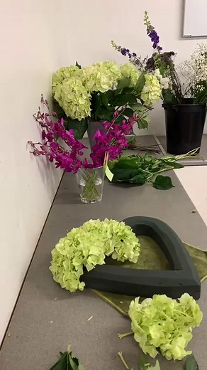 5K views · 29 reactions | Our timelapse shows the process of making a heart wreath funeral tribute using bright cerise dendrobium orchids, green hydrangea, green trick dianthus and green spray chrysanthemums. #timelapse #funeralflowers #heartwreath #funeraltribute #funeralflorist | Simply Flowers | Facebook