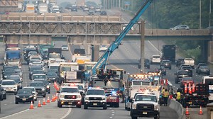 Route 80 shut down in Saddle Brook due to overturned truck, creating morning traffic