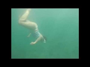 Underwater woman freediving no fins M001