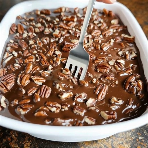 Old Fashion Pecan Candy Ingredients: 1. 2 cups sugar 2. 1 stick salted butter 3. 4 tablespoons light cocoa 4. 6-ounce can evaporated milk 5. 1 tablespoon vanilla extract 6. 2 cups pecans, chopped Directions: 1. Mix sugar, milk, butter, and cocoa in a medium saucepan over high heat. Bring it to a hard boil. 2. Boil the mixture for 8 minutes. 3. Add the chopped pecans (or any nuts you prefer) and continue boiling for an additional 2 minutes. 4. Turn off the heat and stir in the vanilla extract. 5.