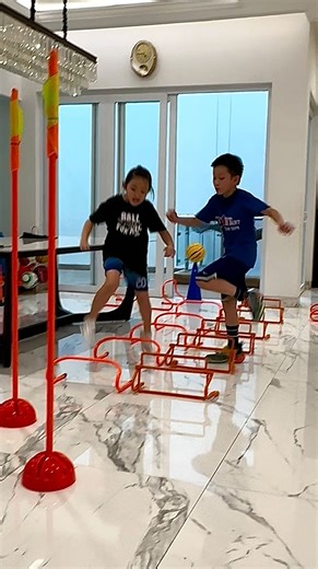 ⚡ PARTNER AGILITY — IN SYNC ⚡ Hop together. Jump together. Hit the speed cut at the same time. Explode into a sprint. Pass on rhythm… Then finish together — all flowing through hurdles, cones, and agility sticks. 💨🔥 This circuit builds timing, trust, and game-speed chemistry. When both players move as one, everything feels smoother — and way harder to stop. 😤 Tag the partner who always stays in sync with you 👀 #agilitytraining #speedandagility #quickfeet #fitkid #viralreels | Nate & Kate Adv