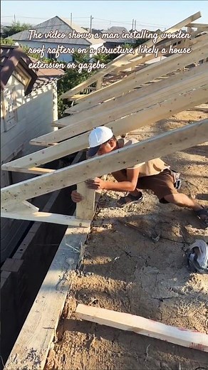​Building the Roof Frame: Man Nailing Wooden Rafters During Construction