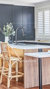 Caesarstone White Attica™ Mineral surface, with its white base and marble-inspired deep grey veining, effortlessly unites the flinty grey cabinetry and timber detailing of this contemporary kitchen. Order a sample of White Attica™ today! https://www.caesarstone.com.au/colours/5143-white-attica/ #caesarstoneau #caesarstone #kitchendesigns #interiordesign #kitchenstyles #modernkitchen #kitcheninspiration #caesarstoneinspires | Caesarstone Australia