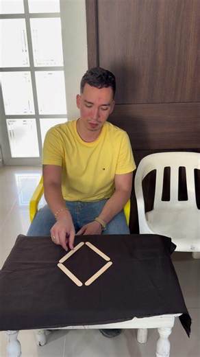 Form 2 triangles by moving 2 sticks