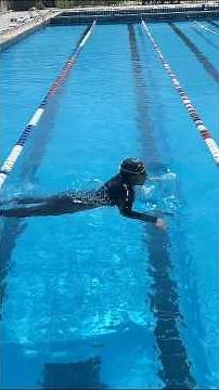 Swimming Breaststroke Across the Pool