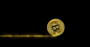 Download Rolling Gold Bitcoin on a black background. for free