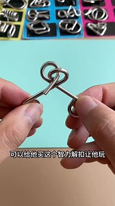 2.5M views · 55K reactions | 智力解扣不仅锻炼孩子的手眼协调和专注力 还可以让孩子认知不同形状的拆分和组合 智力环购买链接：https://invl.io/cljwtmk | 萌星玩具盒 Cutie Toybox | Facebook