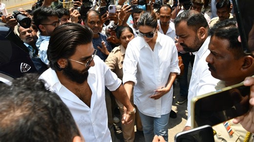 Deepika Padukone cradles baby bump as she arrives to vote with husband Ranveer