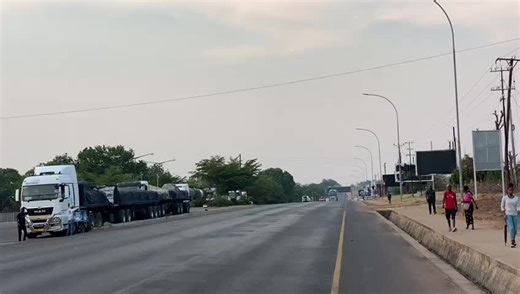 Large Blue Truck Driving on Highway Scenes