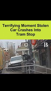 Caught on camera! 😨 Three people barely escape as a stolen car hurtles toward them before crashing into a tram stop. Watch the dramatic footage unfold! . . . #ShockingEscape #StolenCar #NearMiss #ViralVideo #trending #news #roadaccident #VehicleCrash | Briefly
