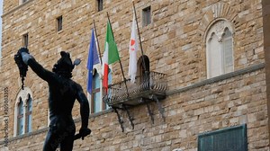 time lapse of Bronze statue of Perseus holding the head of Medusa in Florence, Piazza della Signoria square, made by Benvenuto Cellini in 1545