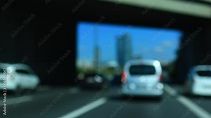 Texture blur, highway and road, cars and transport, roadside and gray asphalt, blue sky on a summer day