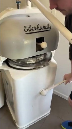 Chef Demonstrates Dough Maker Machine - 1309928