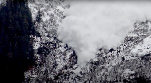 Cool aerial footage of avalanche control with explosives