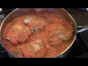 Chicken thighs in pink sauce with spinach and basil