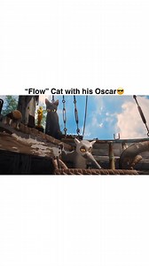 New video of “Flow” cat with his Oscar is super cool! Director Gints Zilbalodis shares yet another one with his cat. #flow #cats #oscar #oscars #academyawards #gintszilbalodis #viral #celebrity #celebritynews #entertainment #awards #director #meow #animated #animation #hollywood #hollywoodlife #celebrities #fyp #foryou #explore | OMG