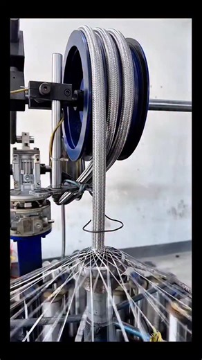 Real Engineerings | Engineering & Technology & Gadgets & DIY | Steel Braiding Mastery: Armoring Hoses for Extreme Durability! ⚙️🔗 ​Observe the hypnotic synchronization of a high-speed Wire Braiding... | Instagram