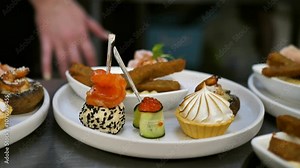 beautifully decorated banquet table with appetizers canapes. buffet for the holiday