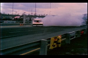 This is our movie trailer for American Nitro. Our DVD is an hour and 15 minutes. We filmed ever major funny car and top fuel dragster from the 1970's along with interviews of the top funny car drivers, engine builders, frame builders, paint shops etc. Listen to Ed Pink explain building nitro engines of the day. Plus the people who built the bodies, paint schemes, and frames of the most famous Funny Cars of the age, like, "The Blue Max". | American Nitro