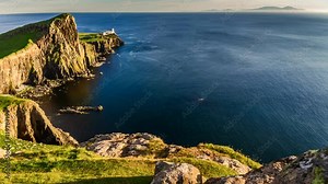 Stunning sunset at Neist point lighthouse, Scotland, United Kingdom, 4k, timelapse Stock Video