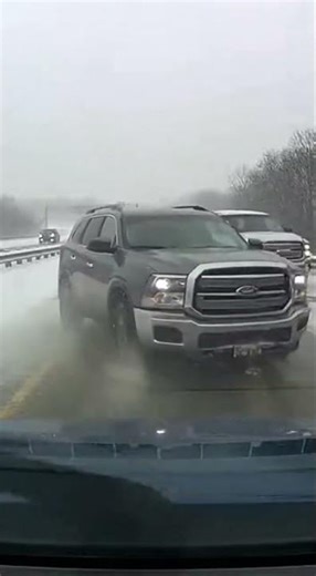 SUV Loses Control On Icy Exit Ramp