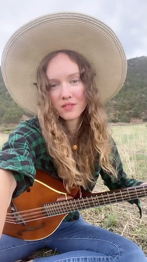 Eva on Instagram: "This one was inspired by The Wet Mountain Gang, lead by Old Man McCoy and his sons. They helped Peg Leg Watson, and Burt Curtis rob a train not far from this very spot and were eventually hunted down by legendary lawmen Tom Horn and Doc Shores 🏔️🤠 . . . . . #ladymoon #ladymooncries #mandolin #octavemandolin #country #reddirtmusic #reddirtcountry #countrywestern #cowgirl #countrygirl #cowboyup #folk #americana #americanamusic #musician #guitar #acousticguitar #musiciansofinst