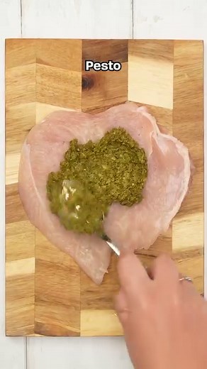 How to make Sicilian Style Chicken Skewers! 🐔 Butterfly a chicken breast and place under a piece of greaseproof paper. 🔨 Using a rolling pin or meat tenderiser flatten the chicken 🍃 Spread with pesto and add slices of mozzarella cheese ✨Roll up tightly and wrap up in proscuitto/parma ham then push slewers through 🔥 Cook in an airfryer at 180 for 15mins, or oven st 180 for 20 mins ❤️ Once cooked you can slice down the middle to reveal the perfect swirls! | Planet Food