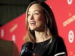 Olivia Wilde in black at white at Target Toycracker Premiere