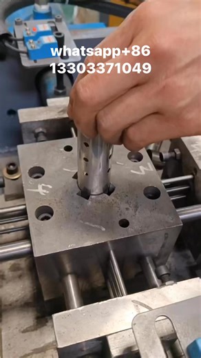 Semi-automatic feeding four-station hydraulic circular pipe punching machine, made in China. | Punching Machine Factory