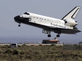 Space shuttle Atlantis returns from final mission