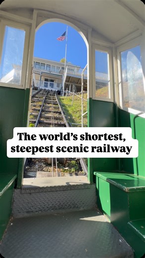 Bayw0lf | Traveling Snackaholic on Instagram: "There’s a saying that goes like this: “See a funicular, Ride a funicular” 🚠 (I say that). So when I was in Dobuque Iowa last week (that’s another story), I found out it is the home of the worlds shortest, steepest scenic railway (funicular)! It’s just 296 feet long, with an elevation gain of 189 feet. It’s got an incredible view, where in one look you can see Iowa, Illinois, and Wisconsin! 🇺🇸 Here’s the wild timeline of this ride, which was origi