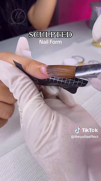Sculpted Nails 💕💅🏼 Build your nail using a nail form. Any length any shape you desire. . This is why I love sculpting a nail. I am using my Perfect Nude Powder . Don’t forget to check out my website and get your nail products today! ✅ www.theyulieeffect.com ✅ Classes are now posted. Go check it out. Link under my bio . . . #sculptednails #nailsartvideos #nailform #nailbeginner #naileducator #nails #phoenixnails