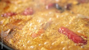 Paella cooking on an electric stove. Typical cuisine of the Valencian Community in Spain