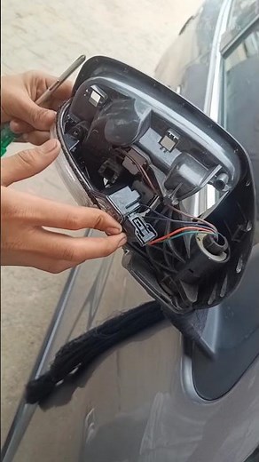 Celerio side mirror indicator replacement.