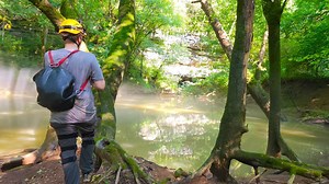 They found a 26-mile cave behind a secret swimming hole - it nearly trapped them