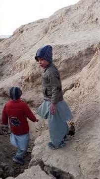 It’s a Video Of Two Children Heading To The River For Enjoyment And Fun.
