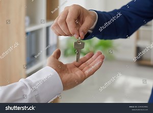 Realtor Handing Over Keys New Home Stock Photo 2245924961 | Shutterstock