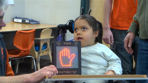 Moorhead robotics team gives first grader a digital hand to raise in class