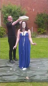 Woman in blue dress gunged