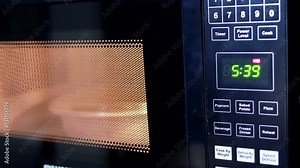Motion of food being heated in microwave oven
