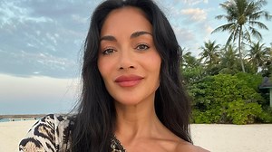 Nicole Scherzinger makes a splash in white cutout bathing suit