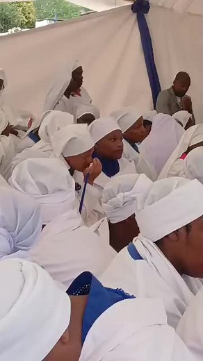 Cultural Gathering Under a White Tent