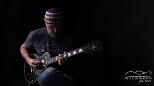 During our latest shoot, Greg Koch was particularly fascinated with this incredible Gibson Custom True Historic '57 Les Paul Custom! We quickly set up our cameras and captured some of the magic in that moment just for you! FEAST, indeed! | Wildwood Guitars
