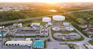 Water treatment facility with multiple tanks and filtration units. Vital infrastructure for sustainable water management and distribution.