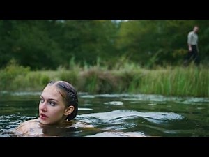 A Girl Swimming Naked in a Lake Notices That She Has Been Watched