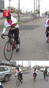 The winner of the solidarity run supporting the campaign #Channel8_for_Rojava raised the flag of Kurdistan. | Channel 8 English